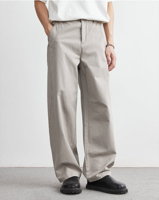 Avslappnade byxor med elastiskt midjeband och jeansliknande look