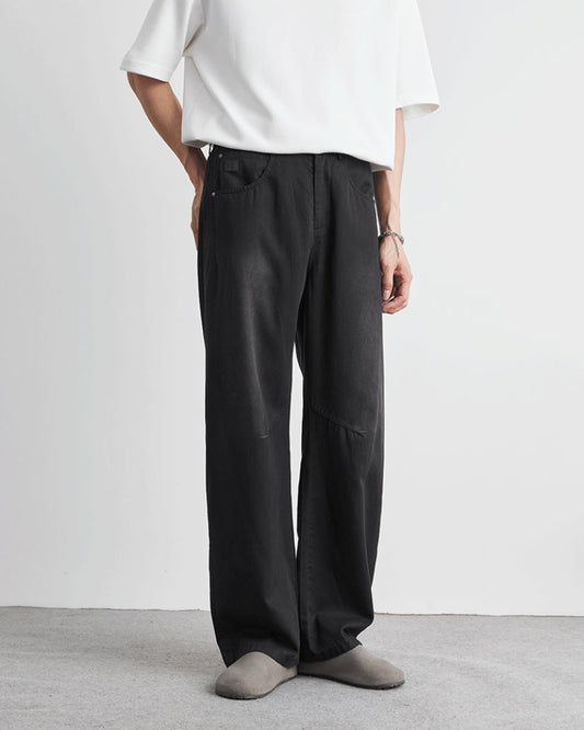Baggy byxor med elastiskt midjeband och jeansliknande