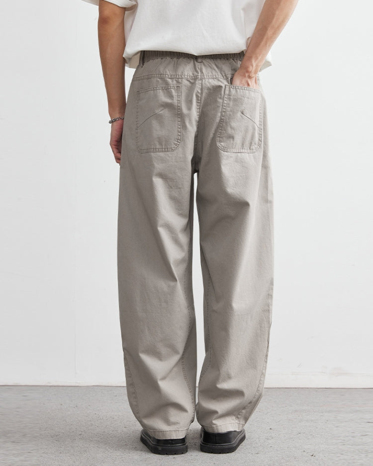 Avslappnade byxor med elastiskt midjeband och jeansliknande look