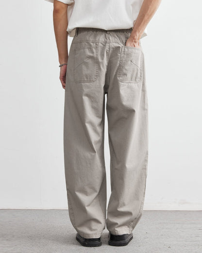 Avslappnade byxor med elastiskt midjeband och jeansliknande look