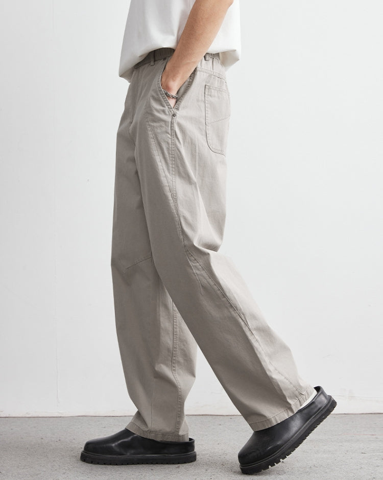 Avslappnade byxor med elastiskt midjeband och jeansliknande look