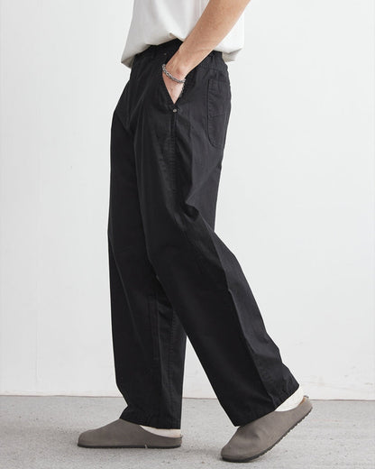 Avslappnade byxor med elastiskt midjeband och jeansliknande look