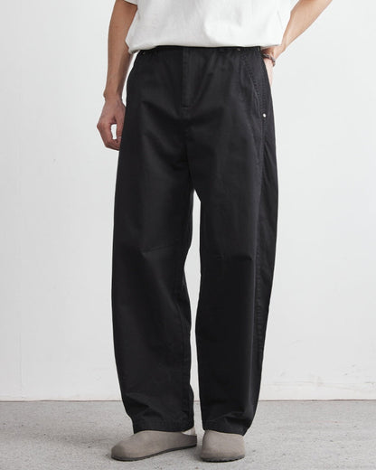 Avslappnade byxor med elastiskt midjeband och jeansliknande look