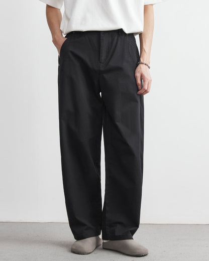 Avslappnade byxor med elastiskt midjeband och jeansliknande look